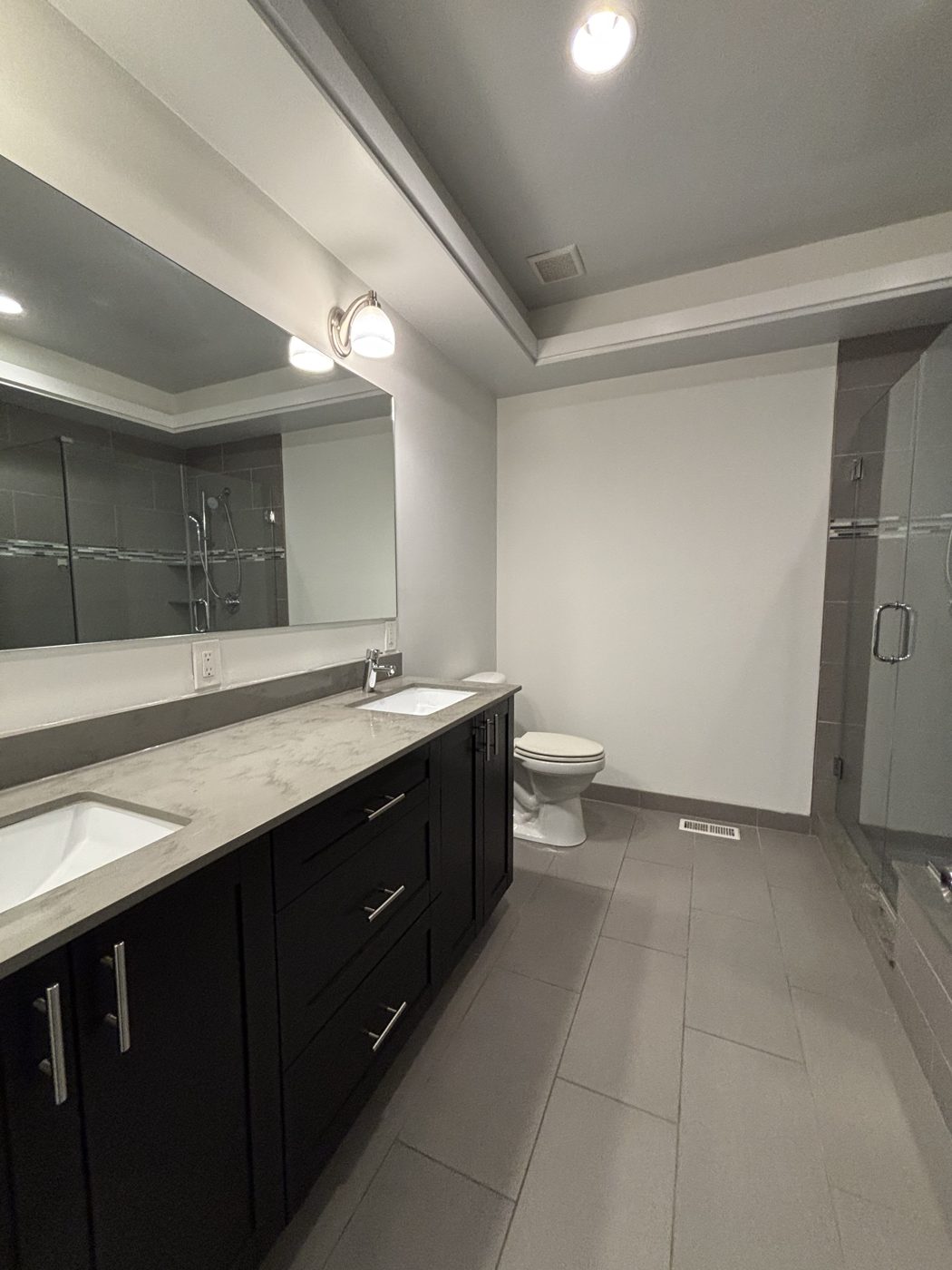 Renovated bathroom with double vanity