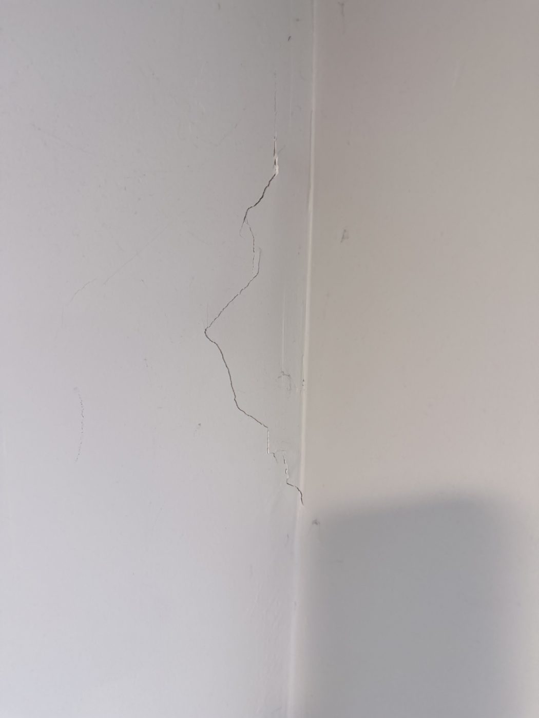 Cracked wall corner before repair