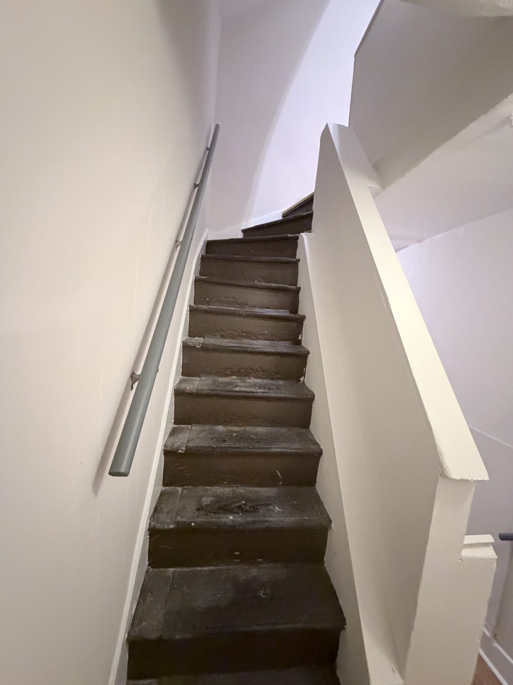 Old worn stairwell before renovation
